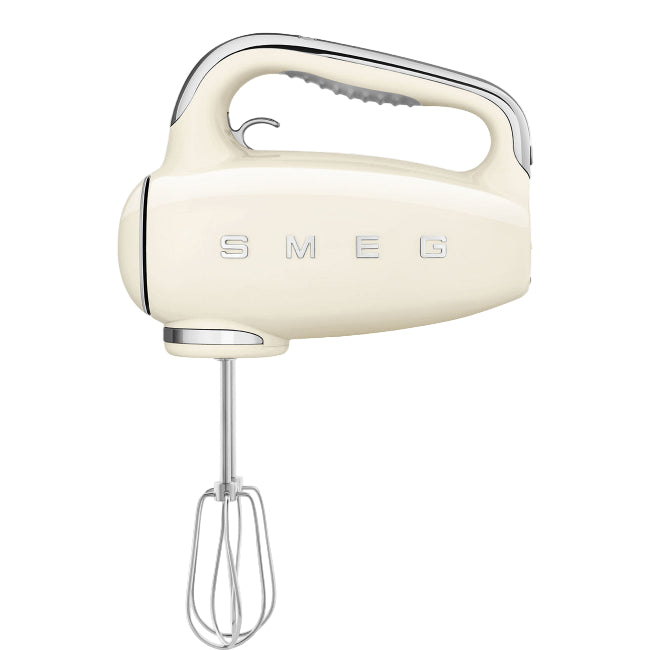 Cream-colored hand mixer with 'Smeg' branding on a white background