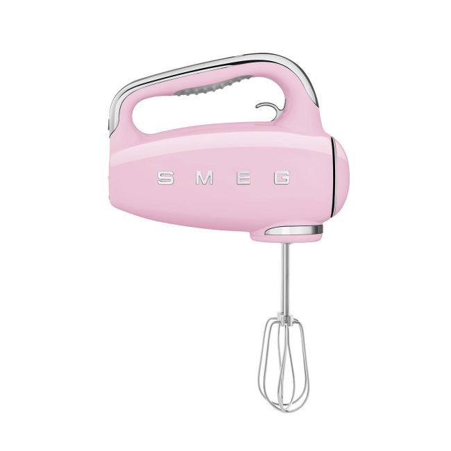 Pink hand mixer with SMEG logo on a white background