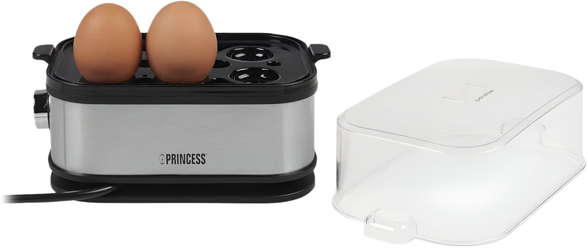 Egg cooker with two eggs inside, next to a white container, on a light background.