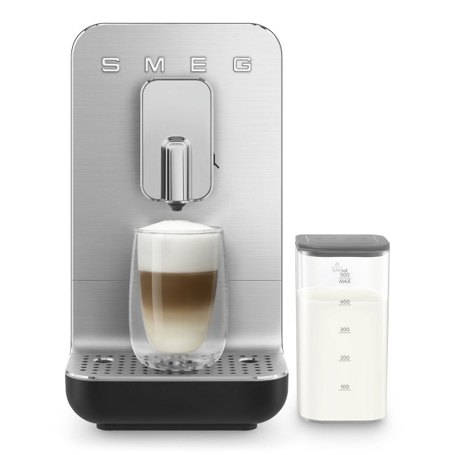 SMEG coffee machine with a glass of coffee and milk container on a white background