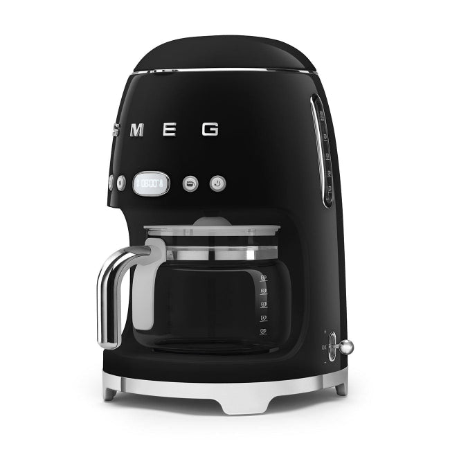 Black coffee machine with glass carafe on a white background
