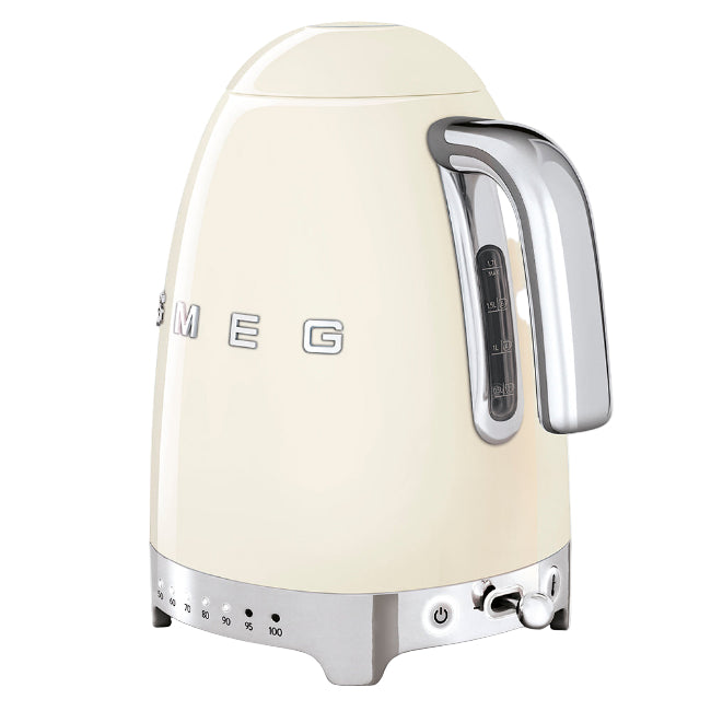 Cream-colored kettle with metallic handle and base on a white background