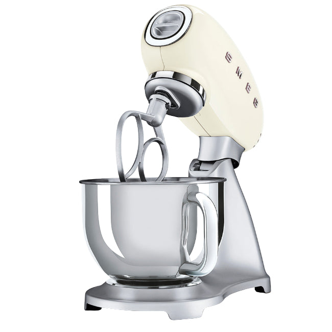 Stand mixer with beige head and glass bowl on a white background