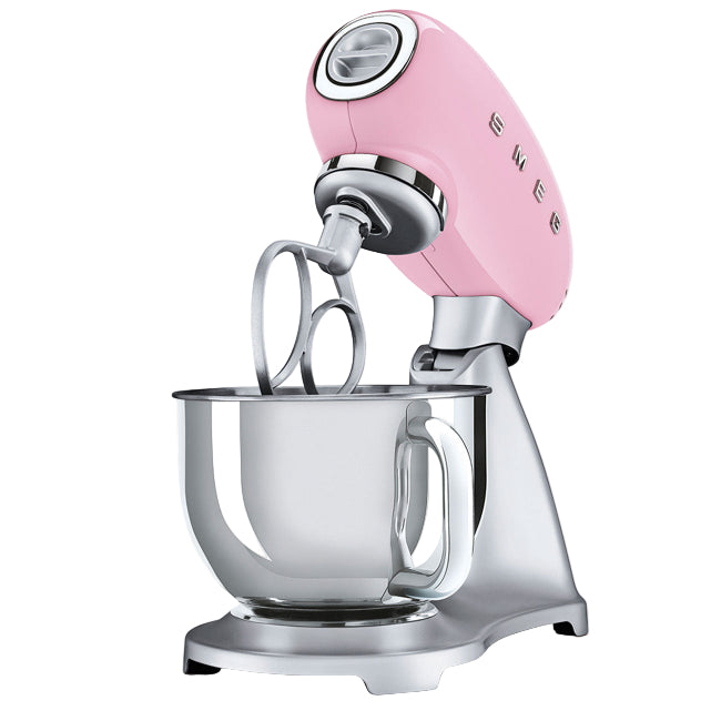 Pink stand mixer with a clear mixing bowl on a white background