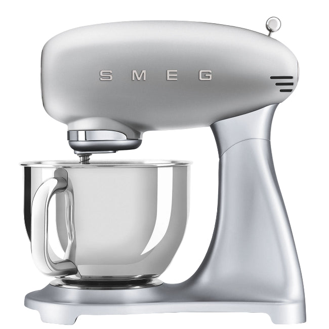 Silver Smeg stand mixer on a white background