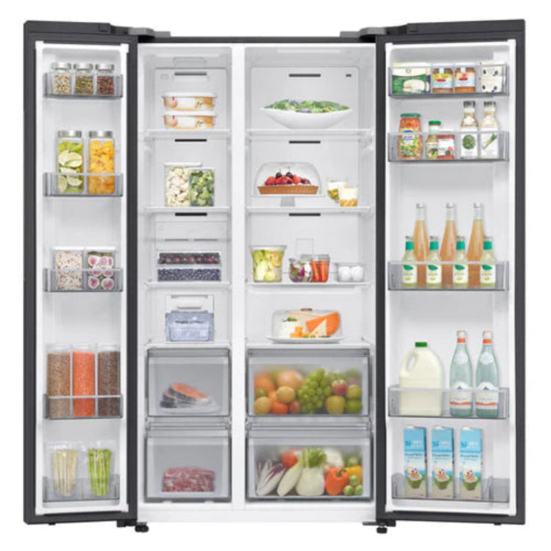 Open refrigerator with various food items inside on a white background