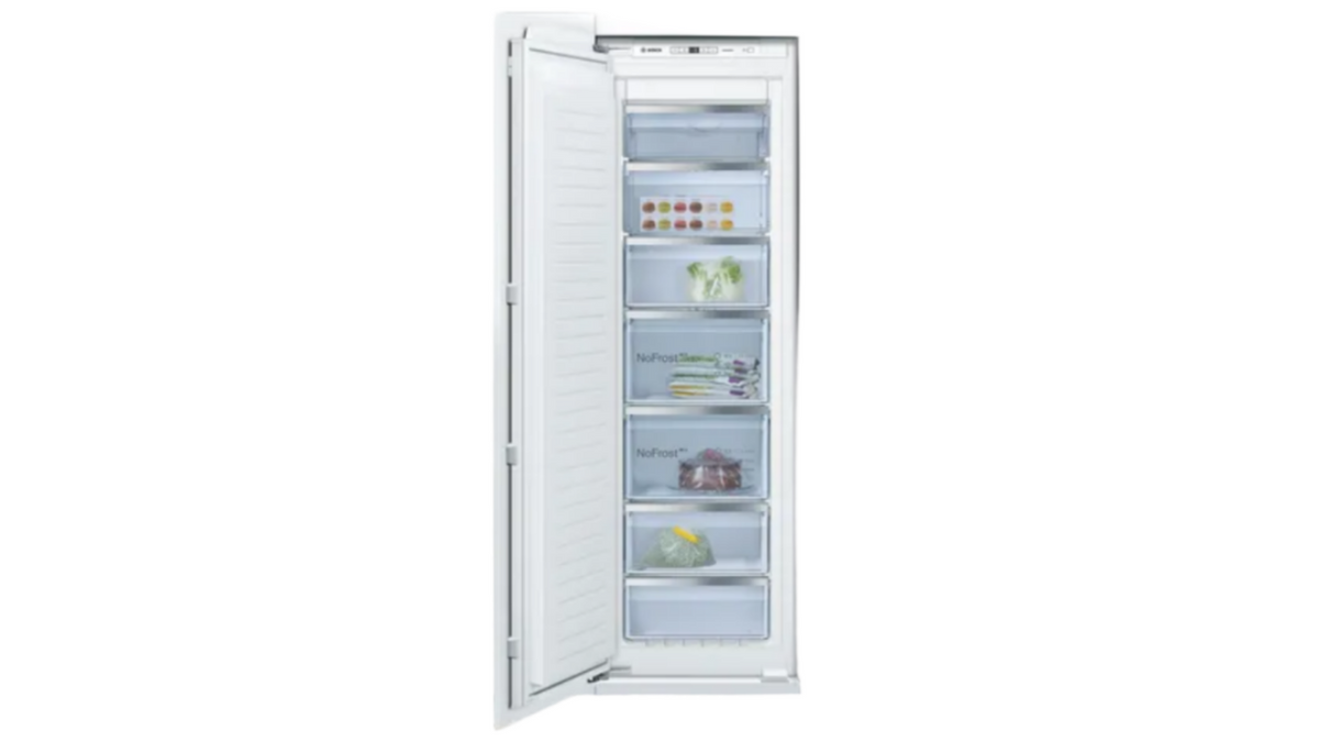 Modern refrigerator with open door displaying interior shelves in a kitchen setting