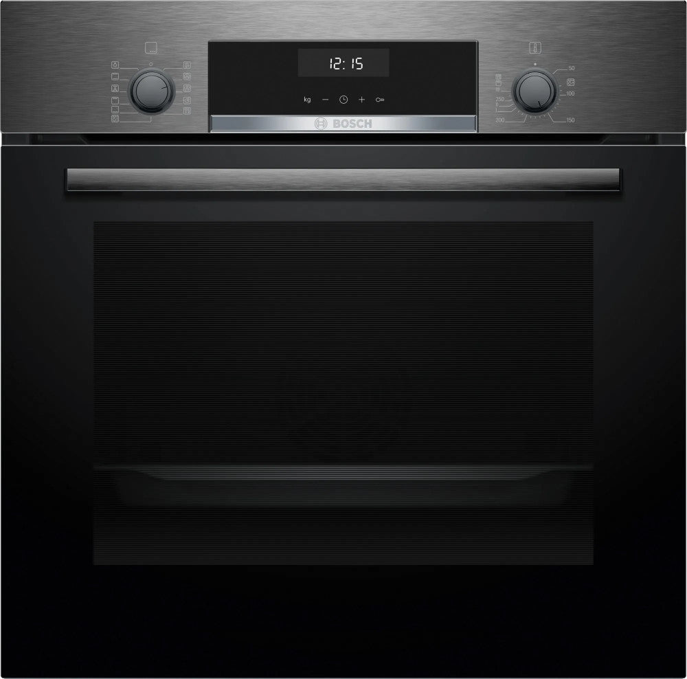 Stainless steel oven with digital display and control knobs on a black background